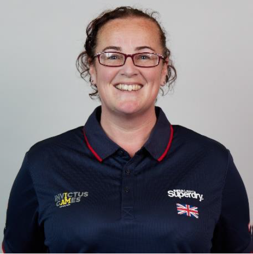 Personnel wears Invictus Games uniform in portrait.